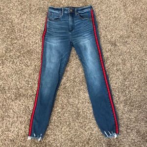 Blue skinnies with red stripe on side
